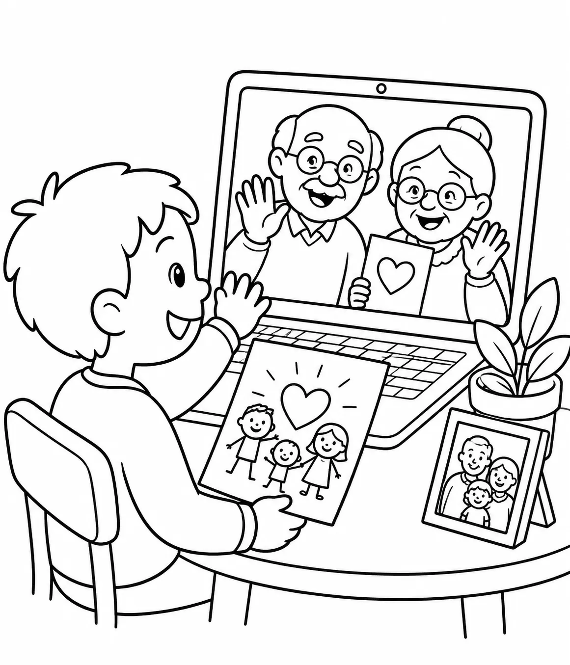 孩子笑着在显示祖父母微笑挥手的笔记本电脑前举起自己画的画