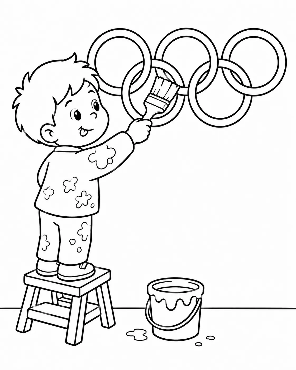 Kind auf Tritthocker malt bunte olympische Ringe mit Pinsel an weiße Wand